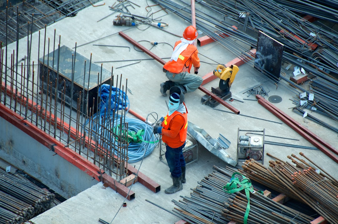Two men working